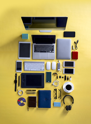 a collection of computer and laptop and accessories